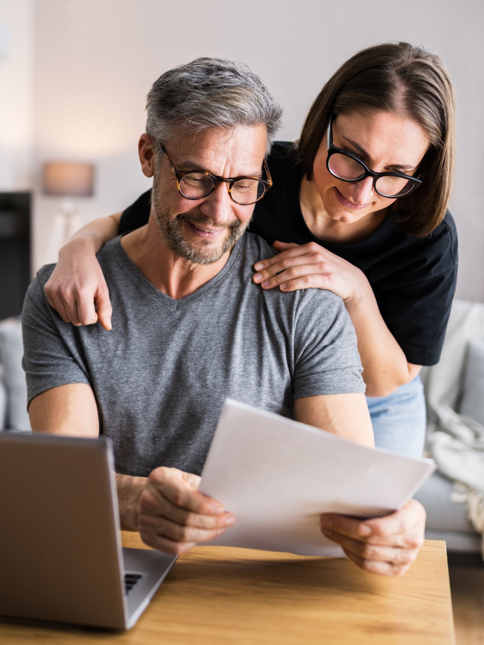 Happy couple planning their finances
